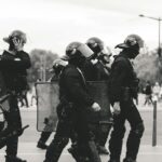 group of police grayscale photo